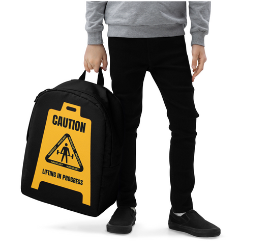 Caution Lifting In Progress Backpack by Mass Cast